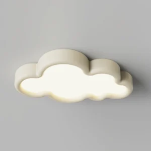 Crown Cloud cream ceiling light illuminated with warm glowing light on gray wall