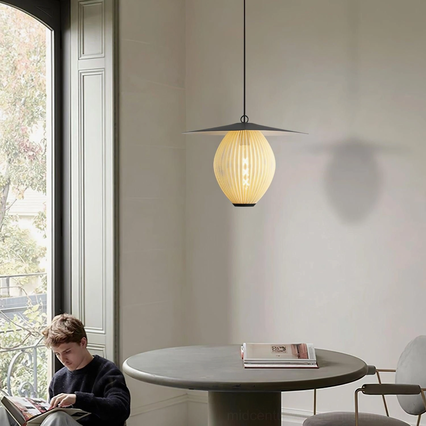 Cream Satellite pendant light on balcony dining corner creating cozy modern atmosphere