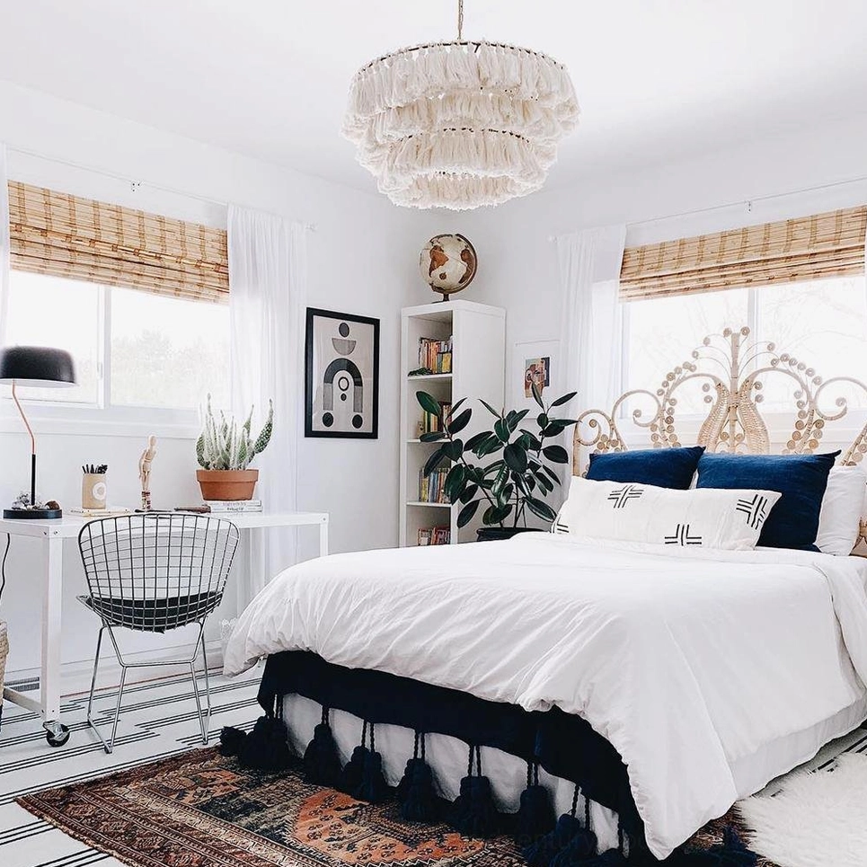 Handcrafted cream tassel light with soft diffused illumination in relaxed bohemian bedroom retreat