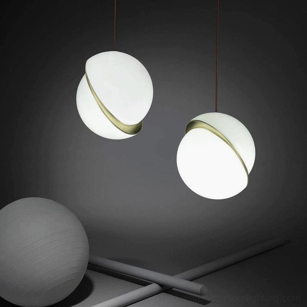 Brushed metal crescent shaped fascia inside illuminated opal pendant sphere