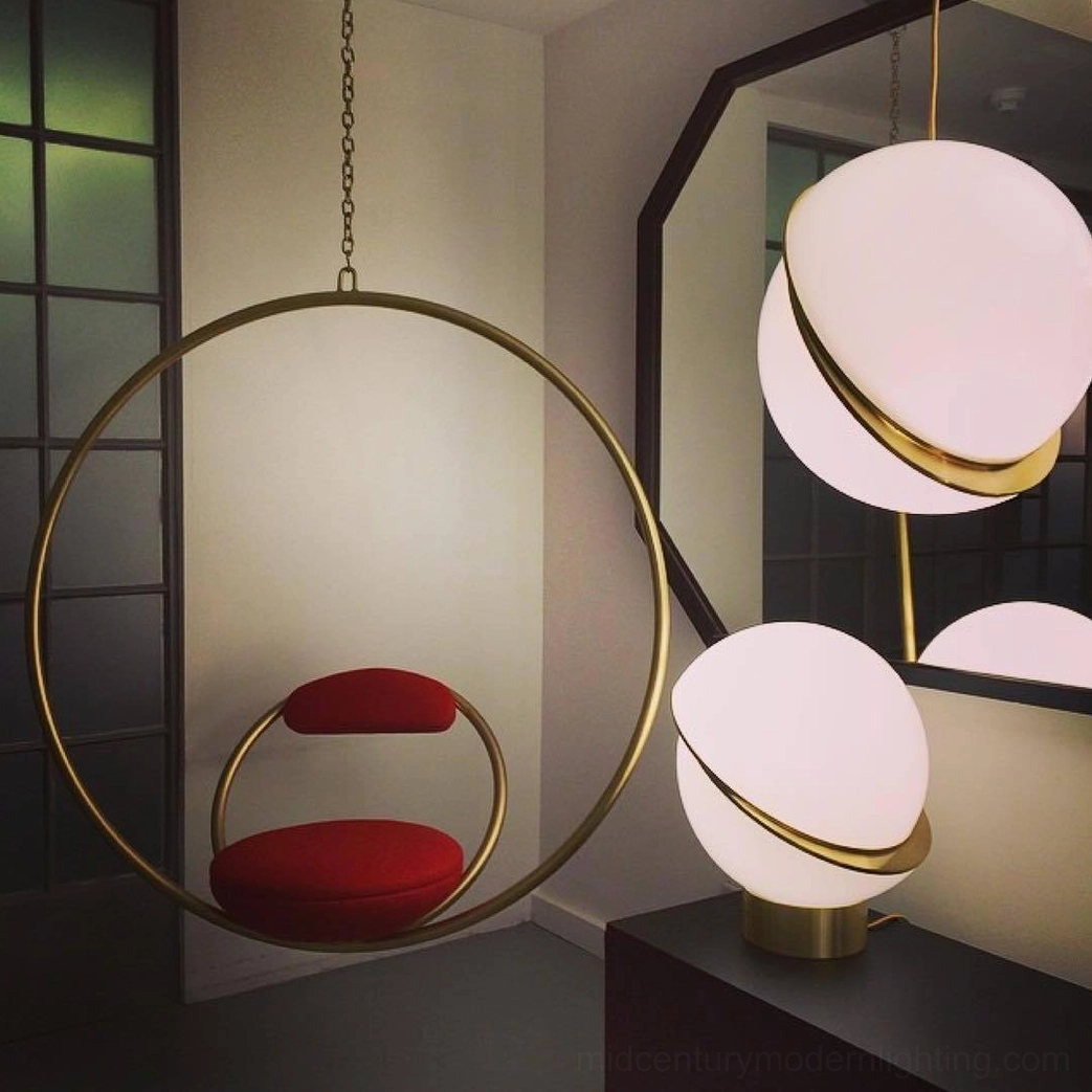 Crescent pendant light fixture suitable for modern minimalist home interiors