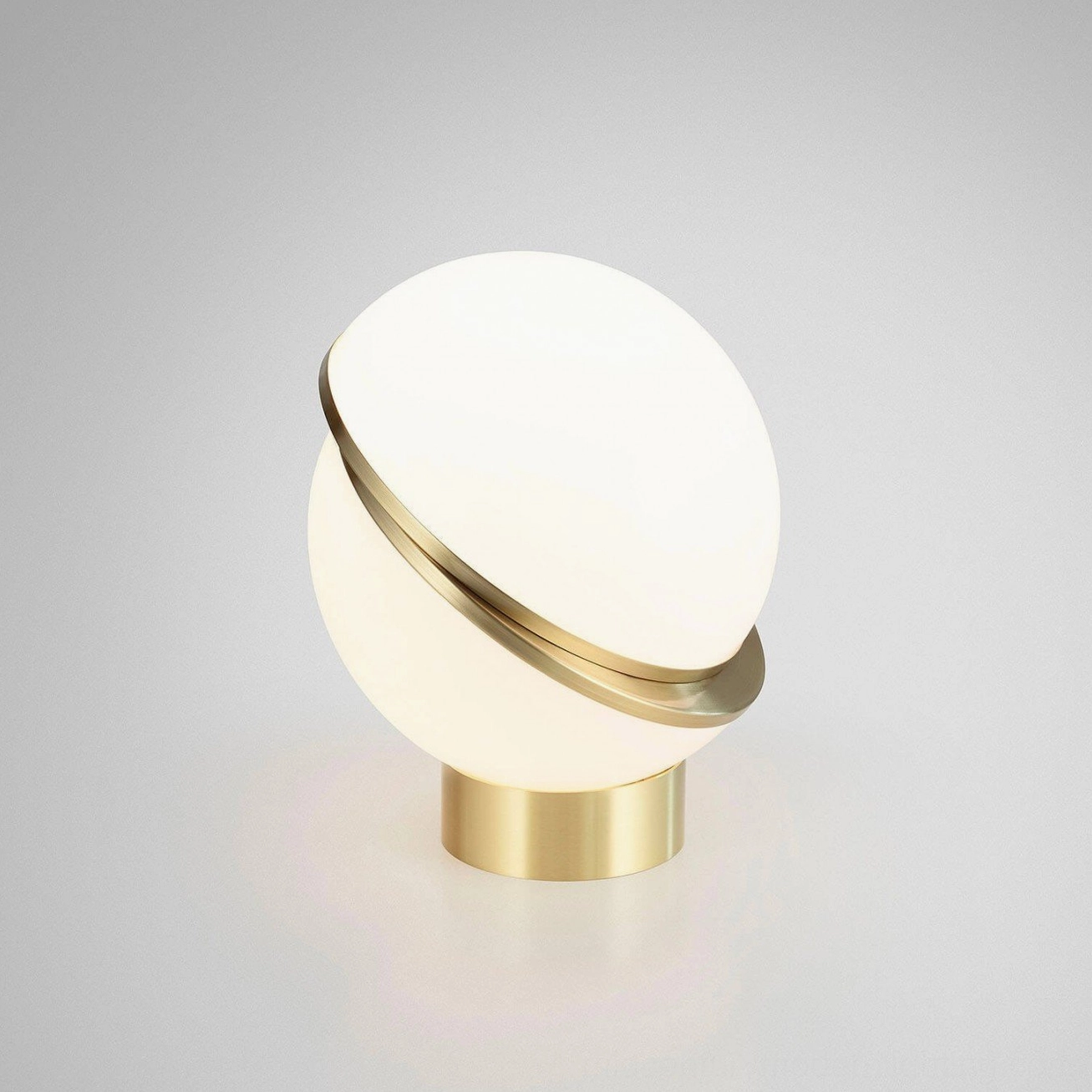 Crescent Table Light brushed brass finish texture and opal acrylic material quality close-up