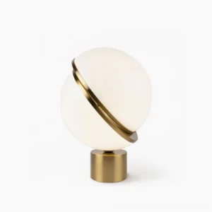Crescent Sphere Table Light front view with opal glass sphere and brushed brass crescent detail on pure white background