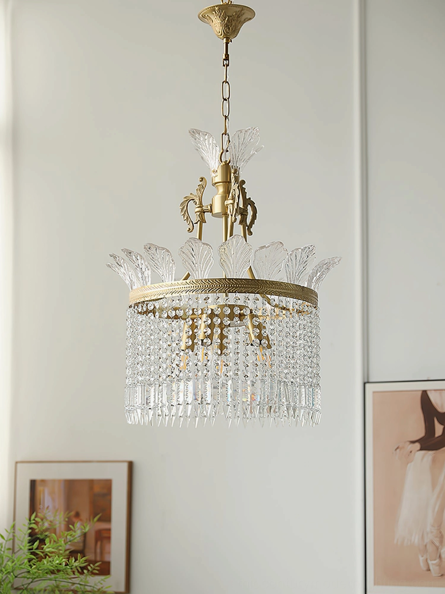 Multi-angle view of mid-century modern crinoline brass chandelier construction