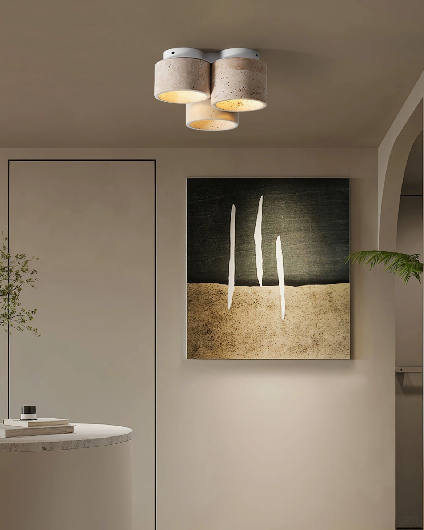Cromia light fixture in art-focused minimalist room demonstrating warm neutral glow and design versatility
