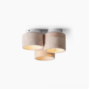 Cromia natural travertine three-light ceiling fixture shown against white background, showcasing cylindrical stone shades with warm wood base