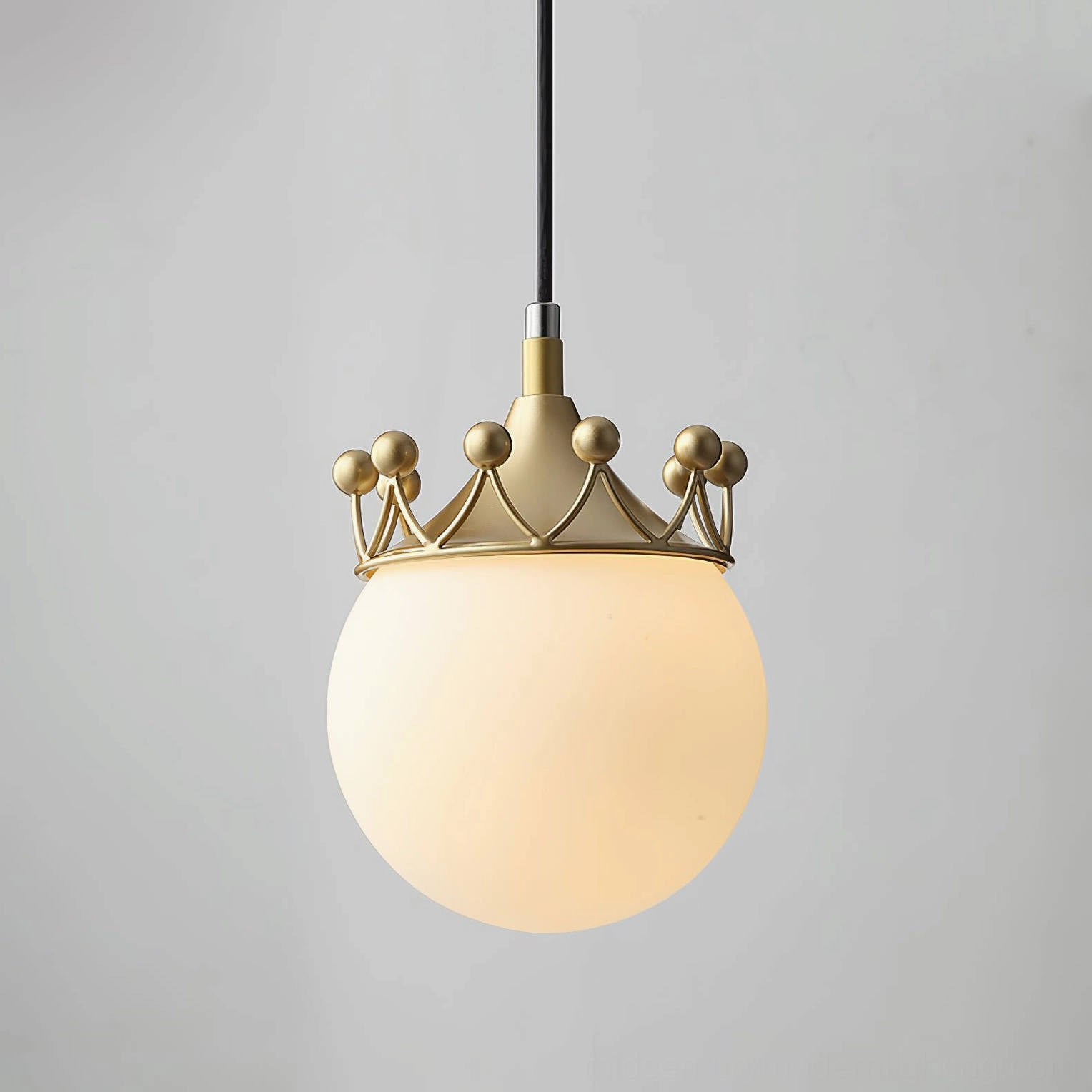 Crown pendant ceiling lamp fixture installed in bedroom, demonstrating proper hanging height and warm ambient illumination effect