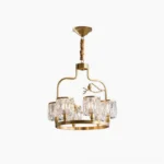 Crystal Bird Chandelier with brass frame and faceted clear crystal columns on white background