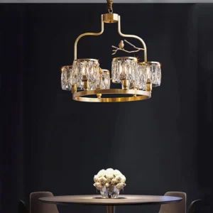 Hanging view of brass and crystal bird chandelier with gold metal finish and luxury minimalist design