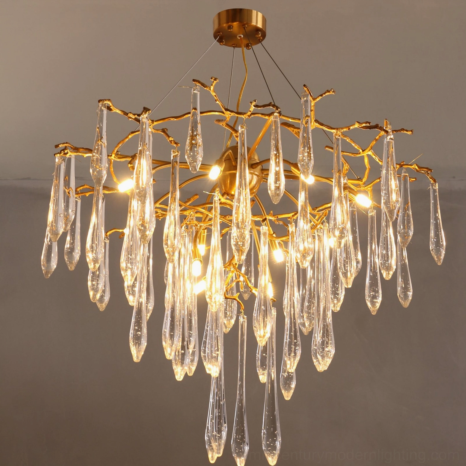 Modern crystal branch chandelier overhead view neutral contemporary interior design space