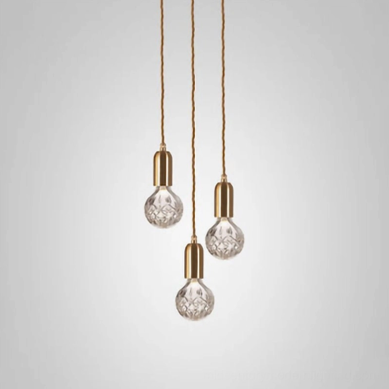 Five-head crystal bulb pendant chandelier creating dramatic overhead lighting statement