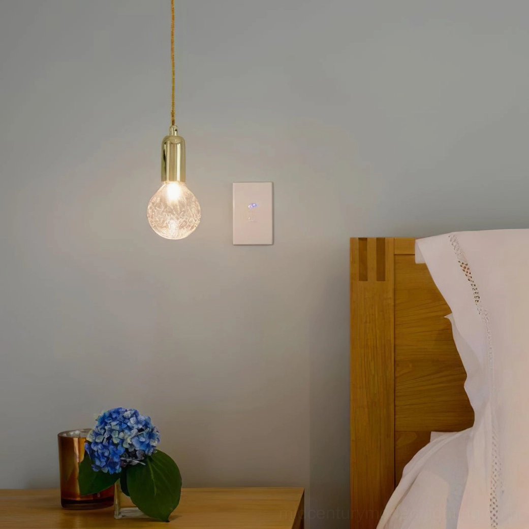 Single crystal bulb pendant light in modern bedroom with luxury minimalist decor