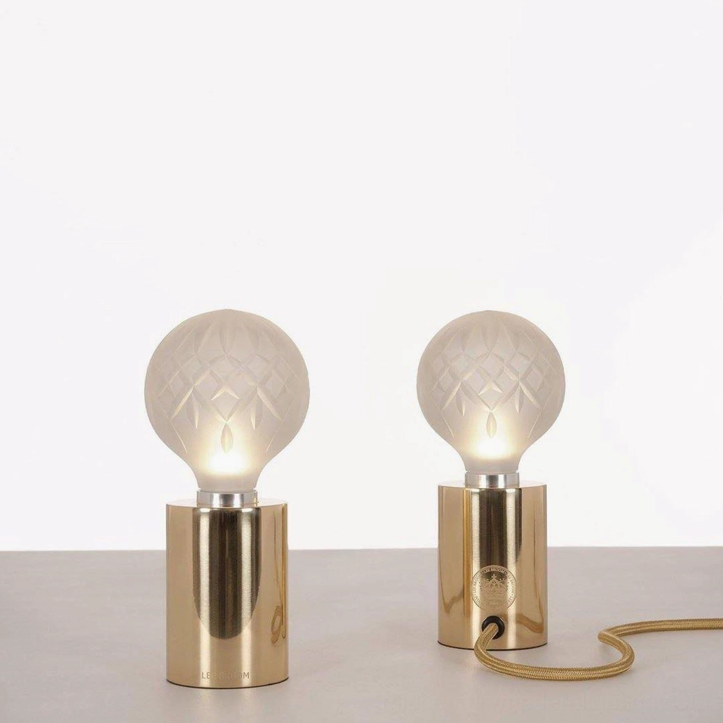 Hand-crafted crystal bulb table lamp demonstrating artisanal quality and design sophistication