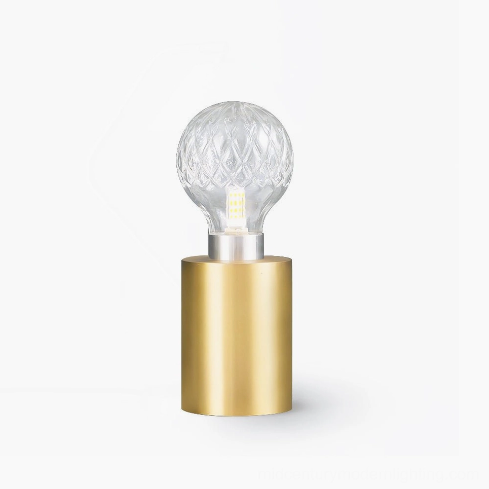 Handcrafted crystal bulb table lamp complete with brass base and clear faceted glass shade