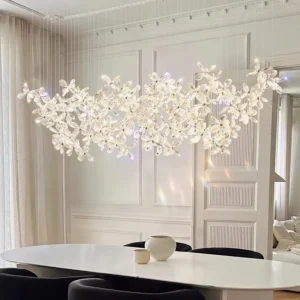 Crystal butterfly chandelier installed in luxury modern dining room, warm glowing LED light reflecting through faceted crystal petals, elegant ambient lighting