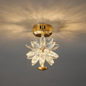 Crystal flower ceiling light fixture installed on gray ceiling, upward angle view showing warm light diffusion through crystal petals