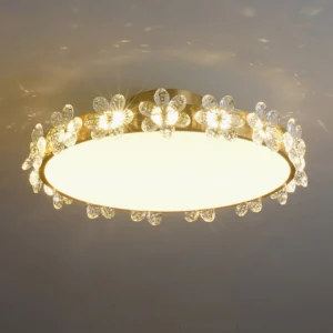 Close-up detail of illuminated petal-shaped crystal accents on modern ceiling light fixture
