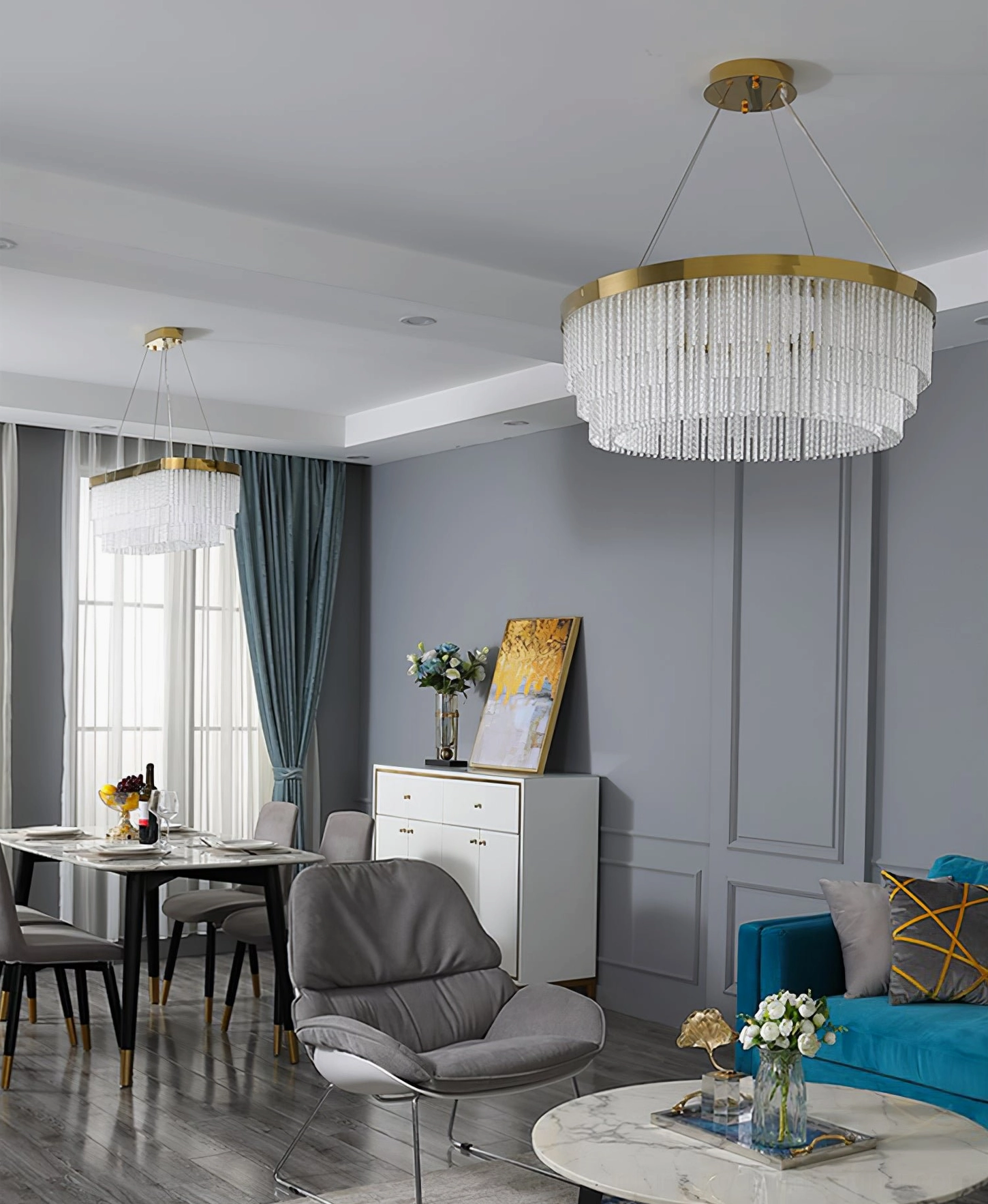 Panoramic view of multiple crystal chandeliers illuminating modern luxury open-plan living and dining space