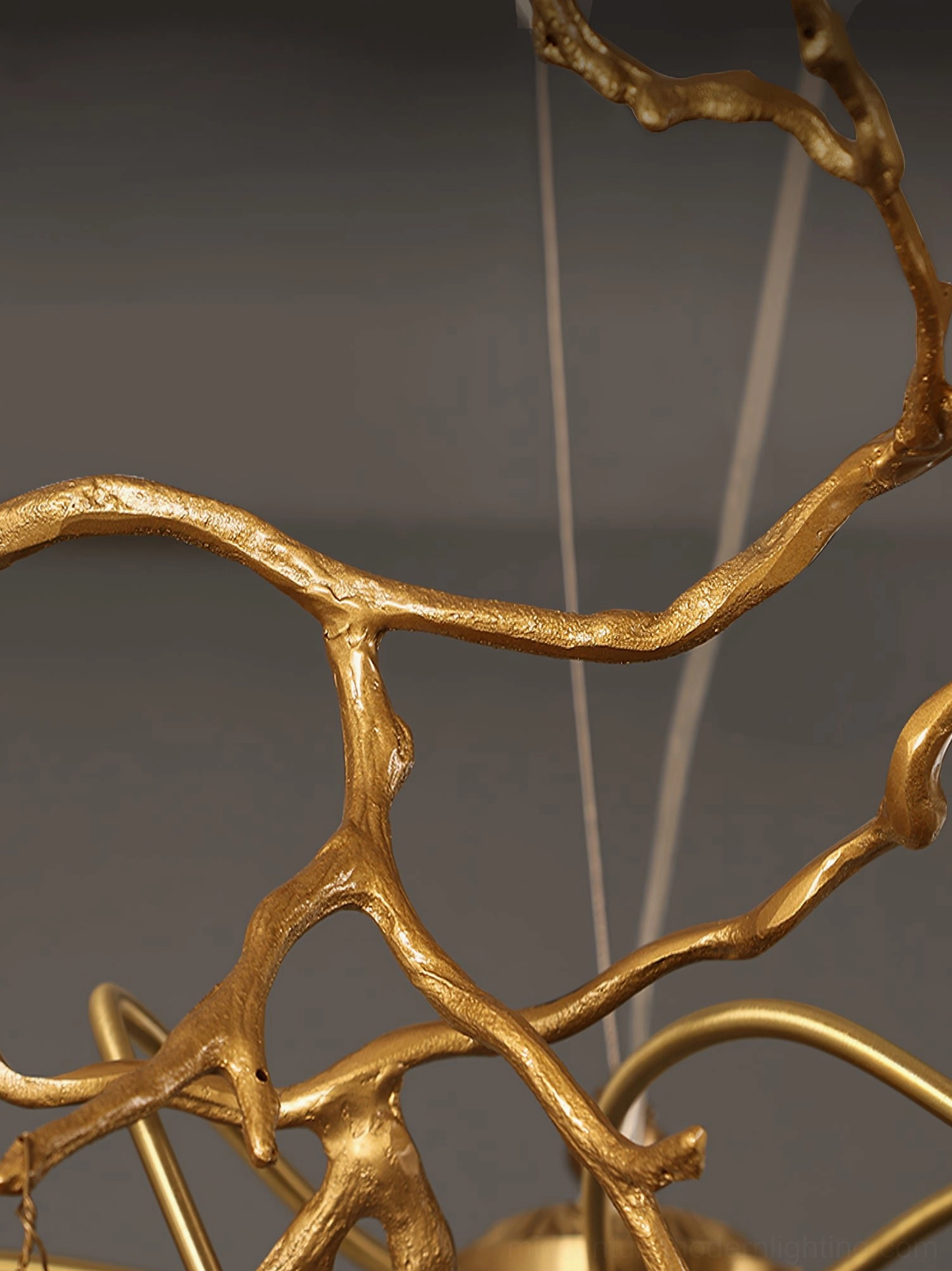 Crystal pendant ceiling light with organic brass branching structure, detail view