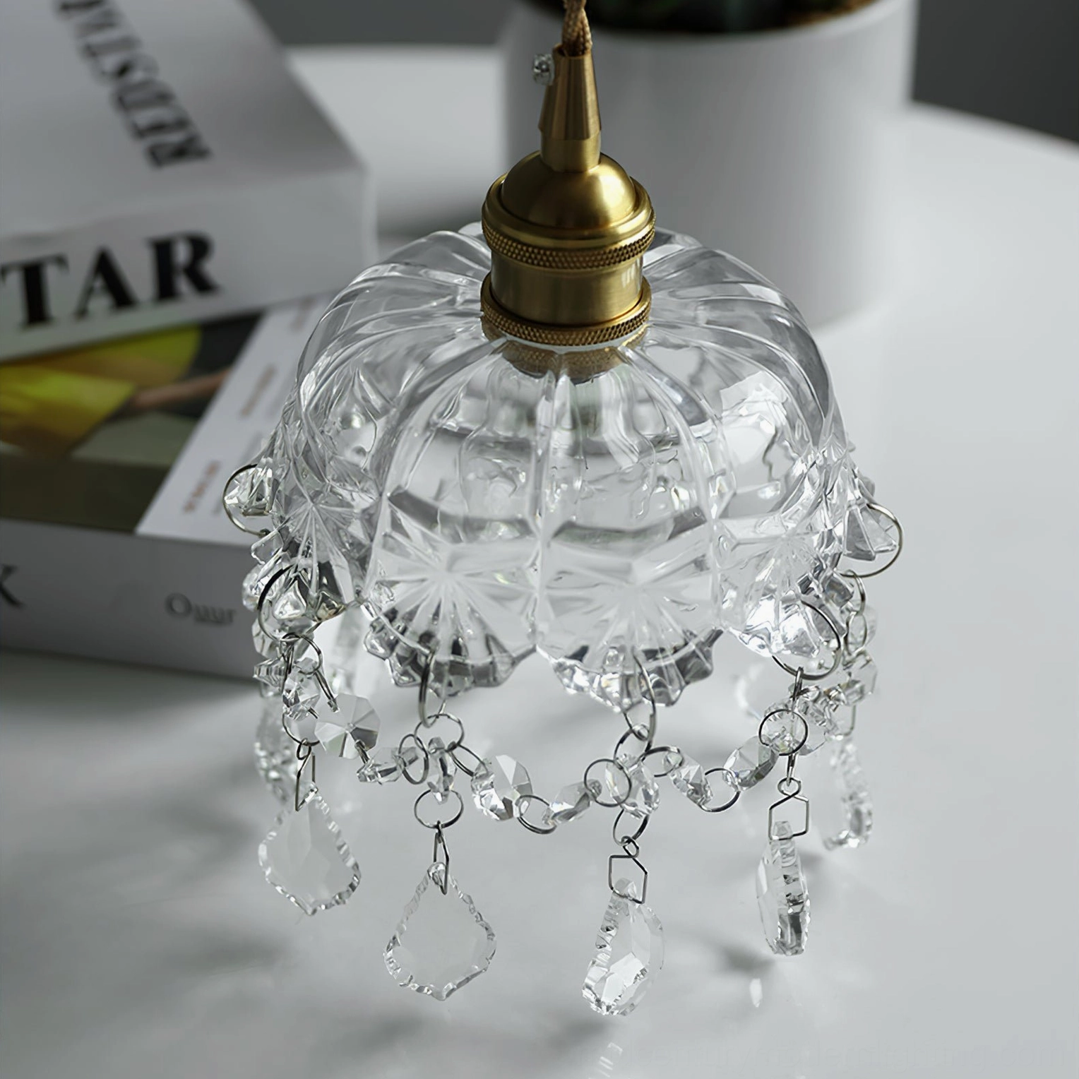 Crystal pendant light with warm Edison bulb style, vintage atmosphere creation