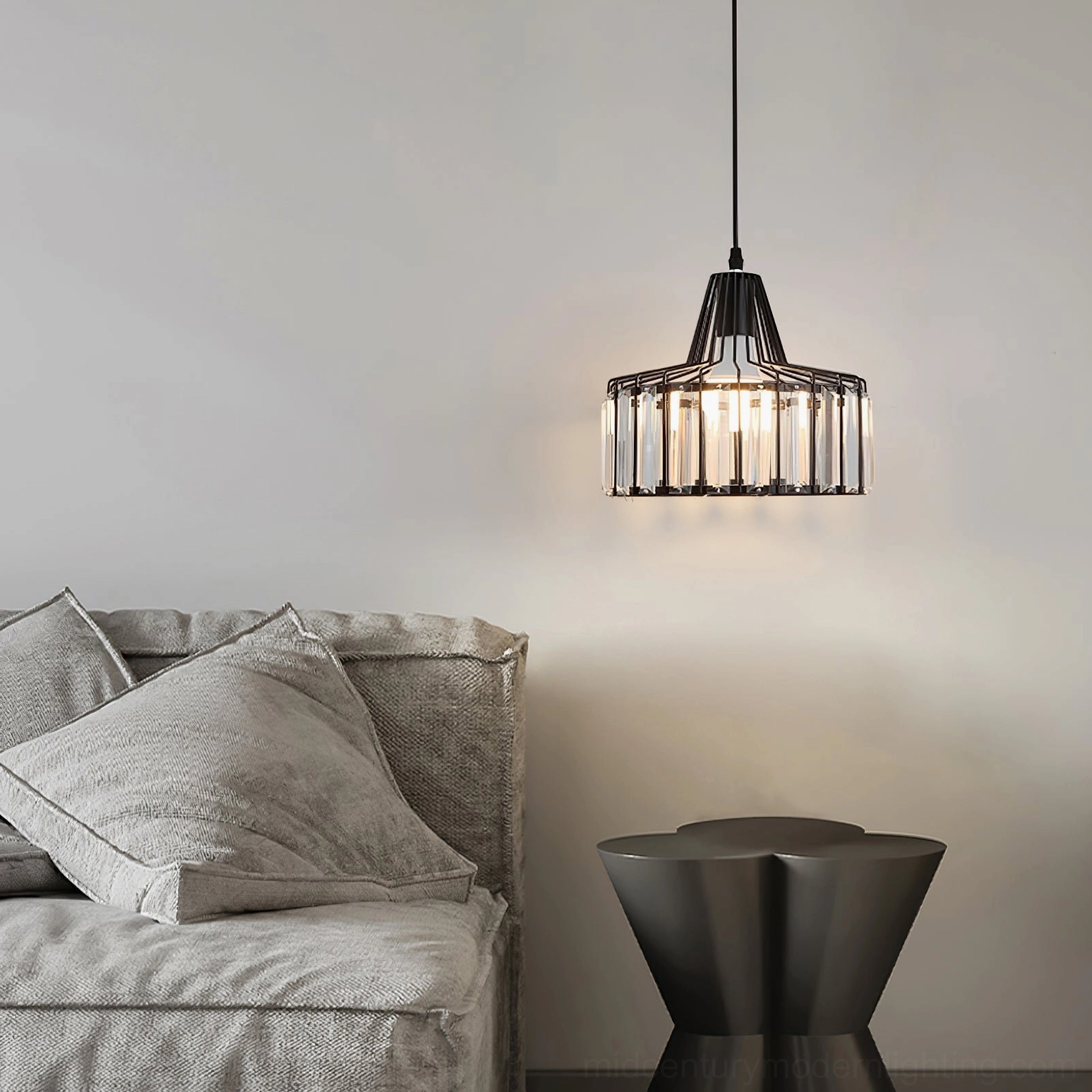 Contemporary crystal pendant light fixture detail showing metal finish and crystal quality
