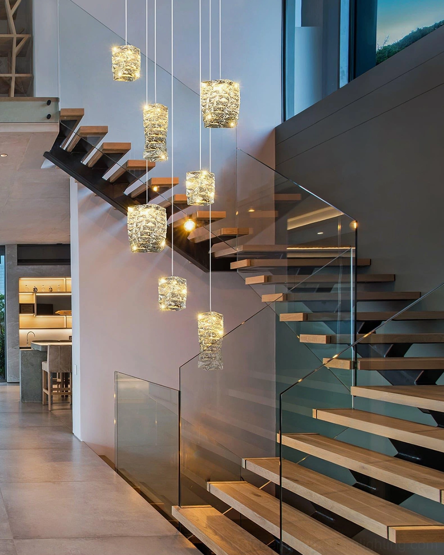 Faceted crystal pendant fixture installed in contemporary hallway creating sophisticated ambient lighting effect