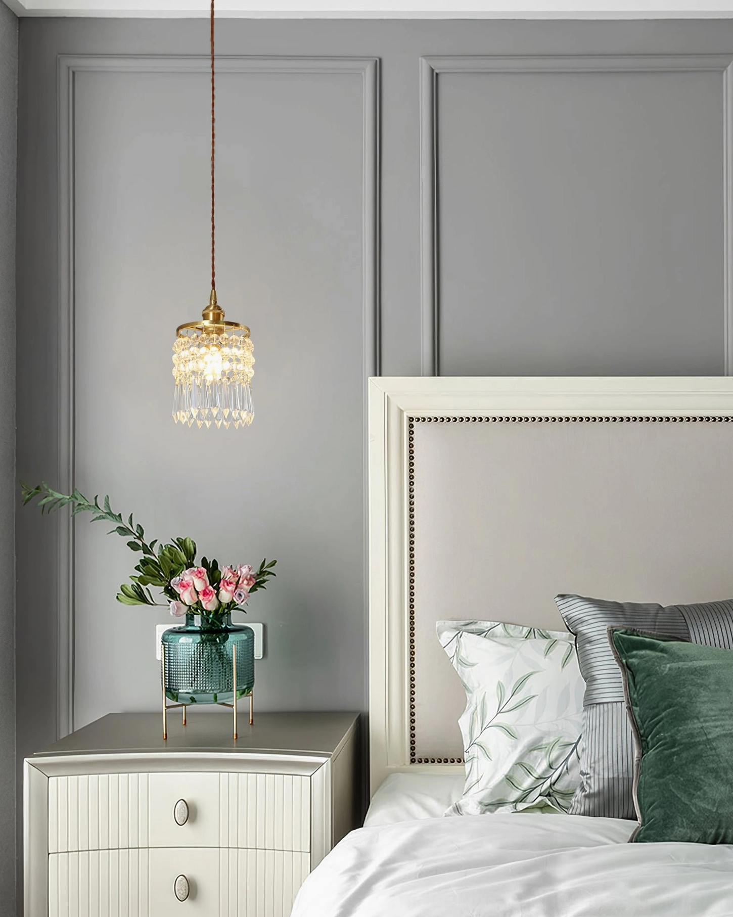 Crystal pendant light creating ambiance, kitchen and dining area application