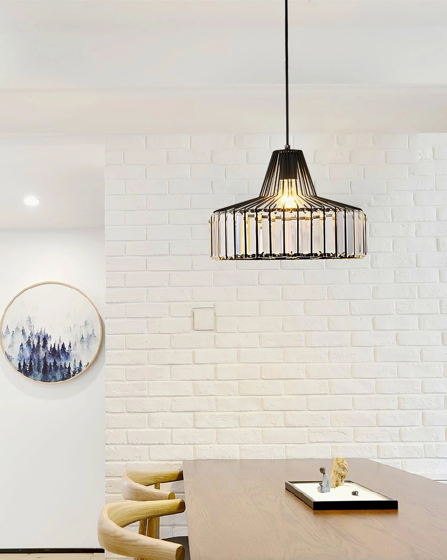 Studio product shot of modern crystal cage pendant lamp with professional lighting