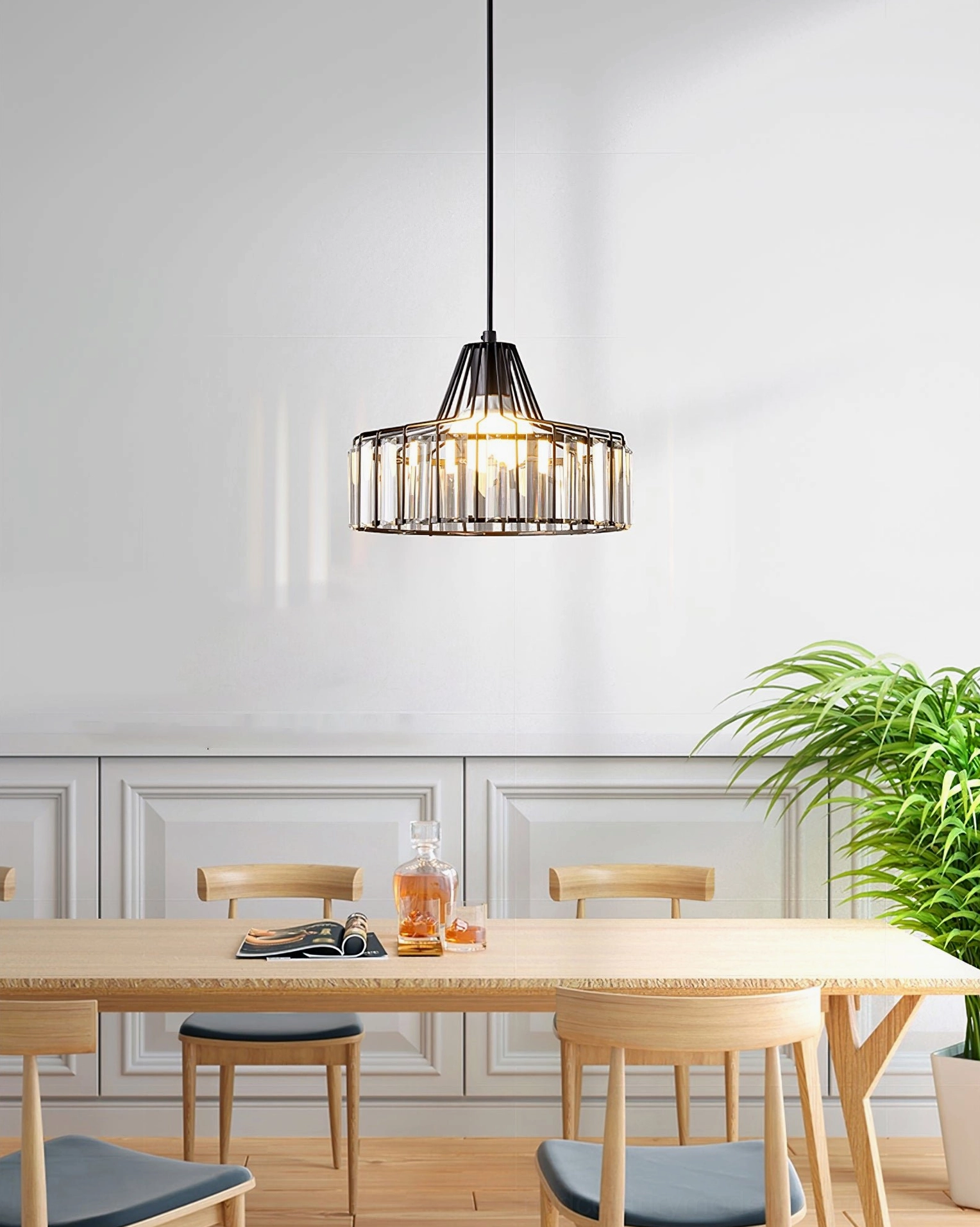 Modern crystal pendant light with multiple size options for various room applications