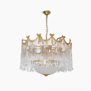 Crystal teardrop chandelier studio frontal view showing brushed brass crown frame and cascading glass rod pendants