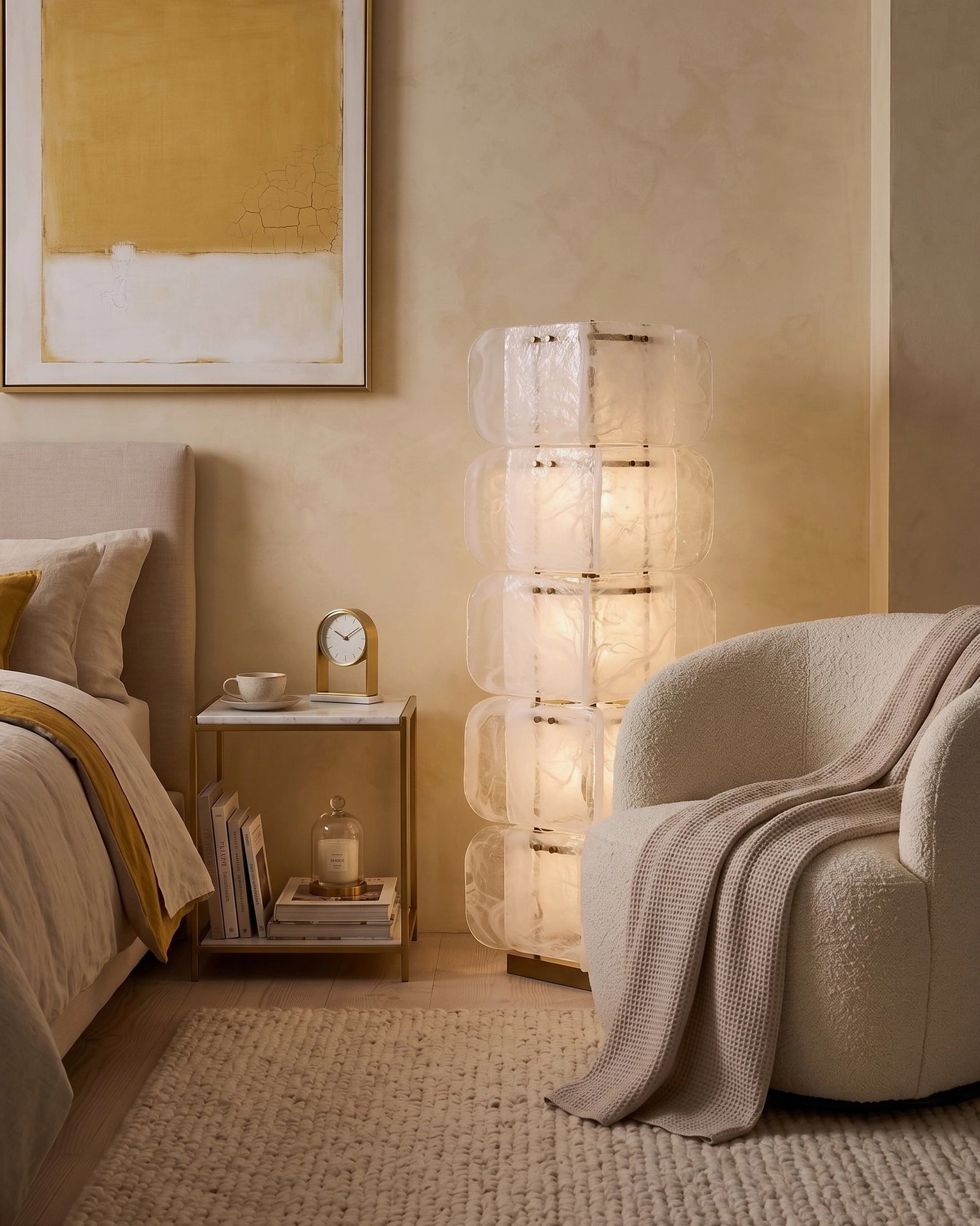 Cubo Totem clear glass five-tier lamp in cozy neutral bedroom corner, soft warm evening light creating layered ambiance