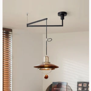 Mid-century modern swing arm pendant light in residential interior - eye level view in contemporary home showing warm ambient lighting