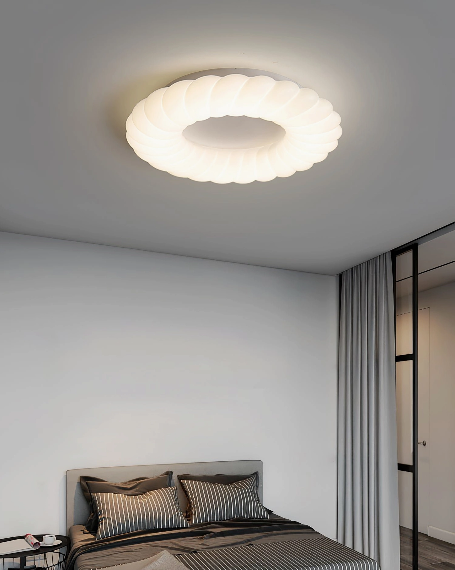 Cumulus flush-mount ceiling fixture in Scandinavian minimalist bedroom aesthetic
