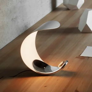 Curl crescent lamp three-quarter angle wooden table concrete wall warm modern interior
