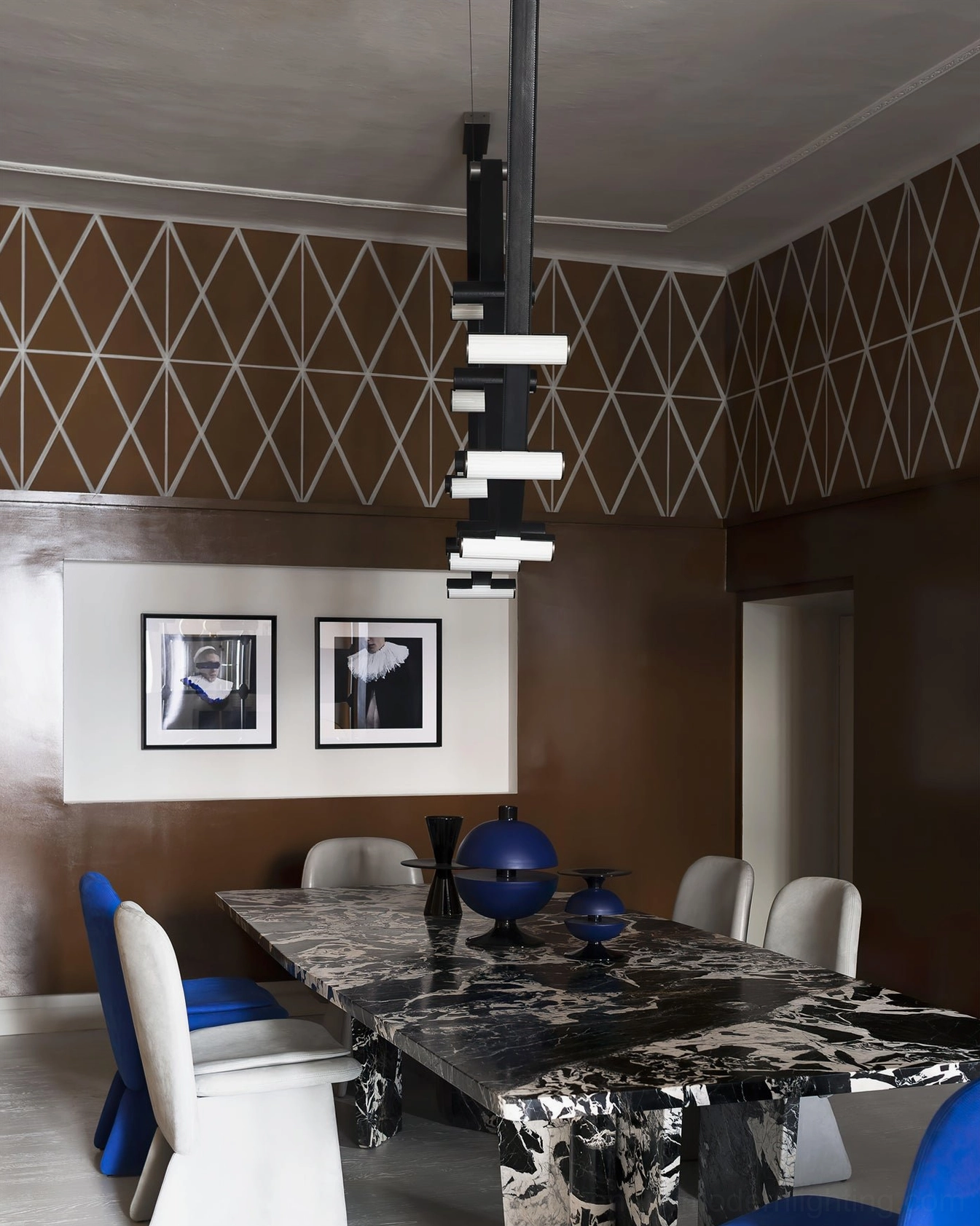 Curve leather chandelier detail view showing premium metal and leather construction, modern sculptural pendant