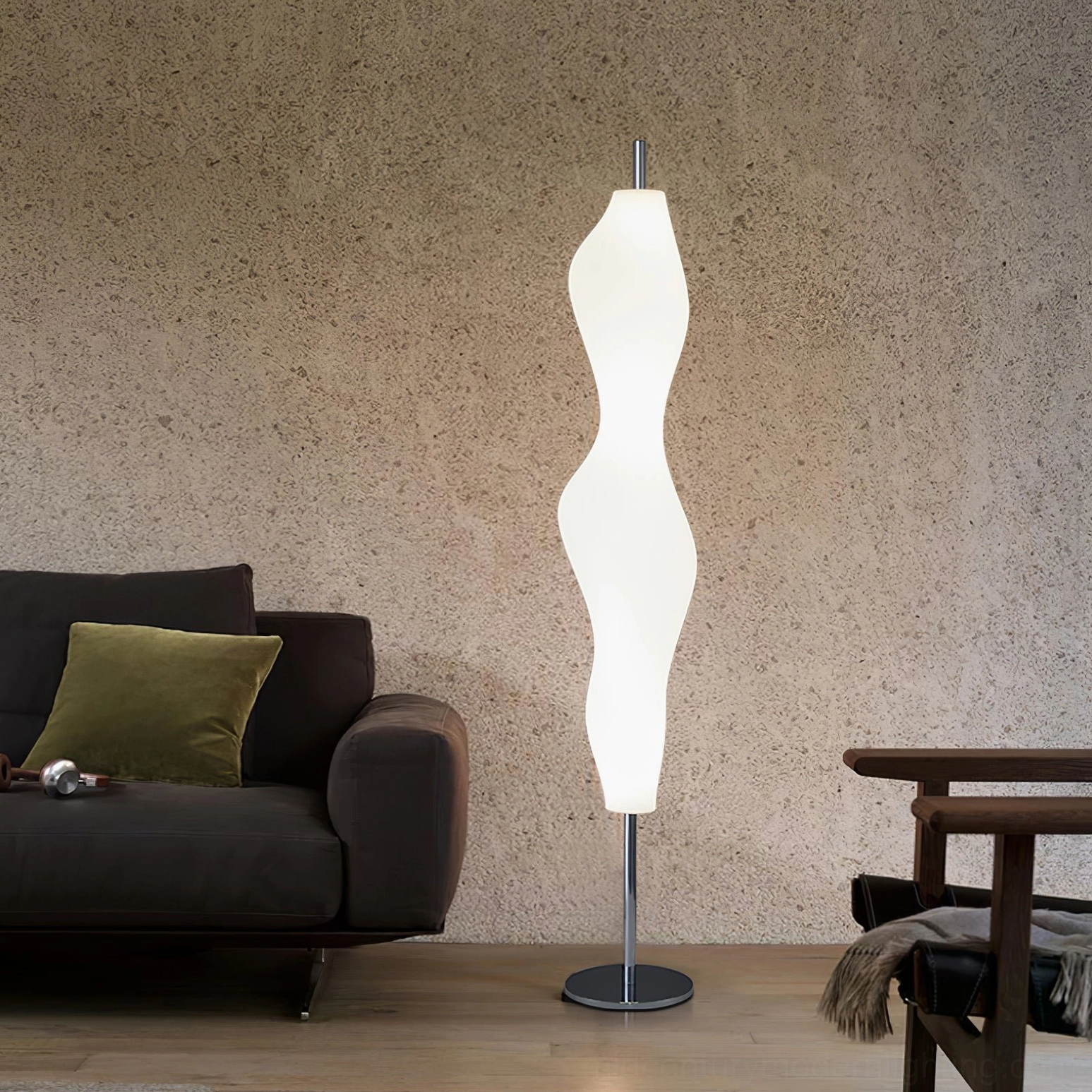 Contemporary wavy floor lamp creating ambient lighting in dark sofa lounge area