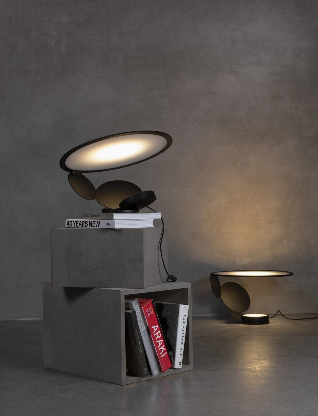 Cut laser-cut table lamp showcasing sculptural form and ambient light diffusion capability
