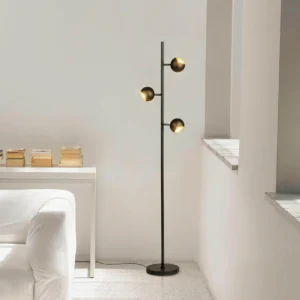 Modern Dakota floor lamp in minimalist Nordic living room setting with white walls and contemporary furniture