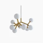Dallas Planet Sputnik pendant chandelier with polished brass frame and frosted moon glass shades on white studio background