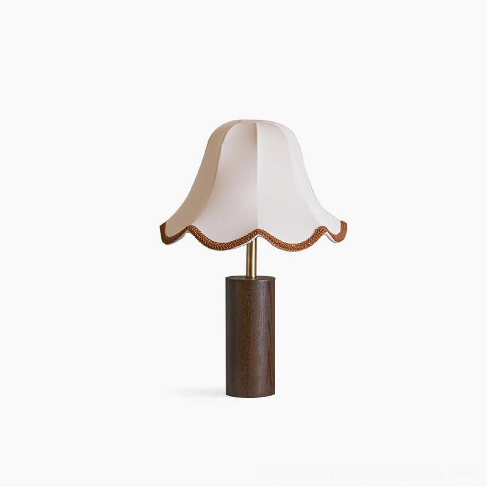 Danika mid-century modern table lamp with scalloped fabric shade and walnut wooden base, frontal studio view