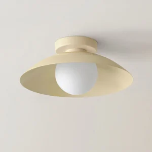 Danoise beige ceiling lamp close-up top angle showing smooth matte metal shade and glass globe