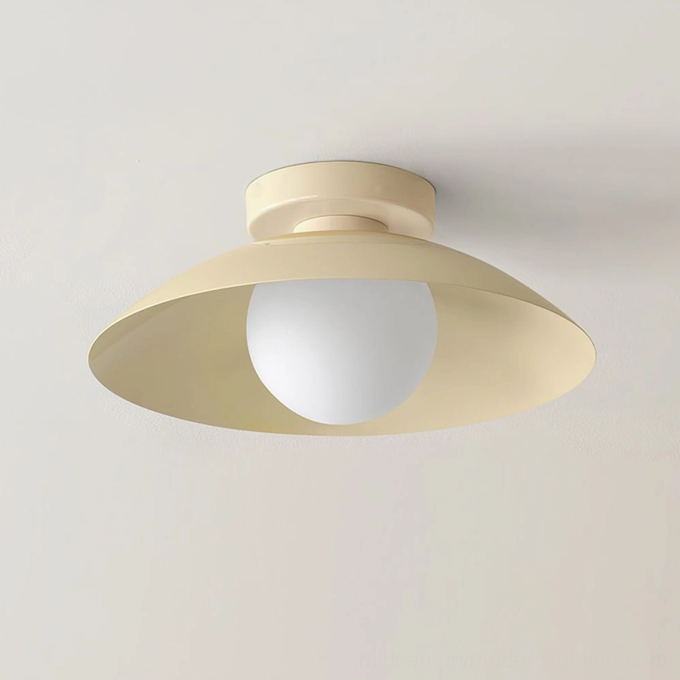 Danoise beige ceiling lamp close-up top angle showing smooth matte metal shade and glass globe