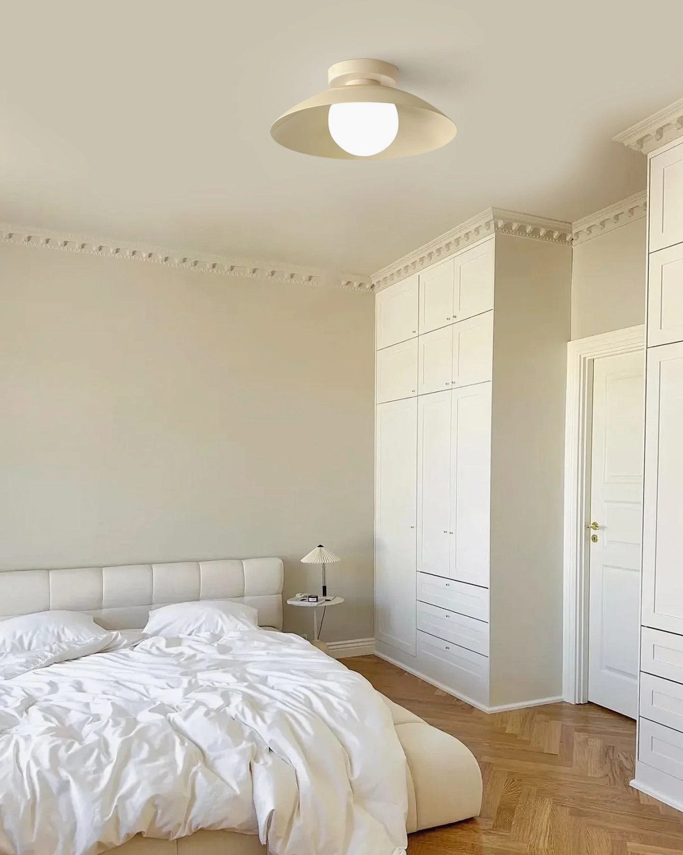 Danoise cream ceiling lamp in modern bedroom corner with Nordic minimalist interior design aesthetic