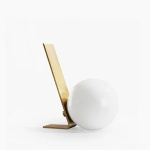 Daphne satin brass table lamp with frosted white glass shade, front view on minimalist background