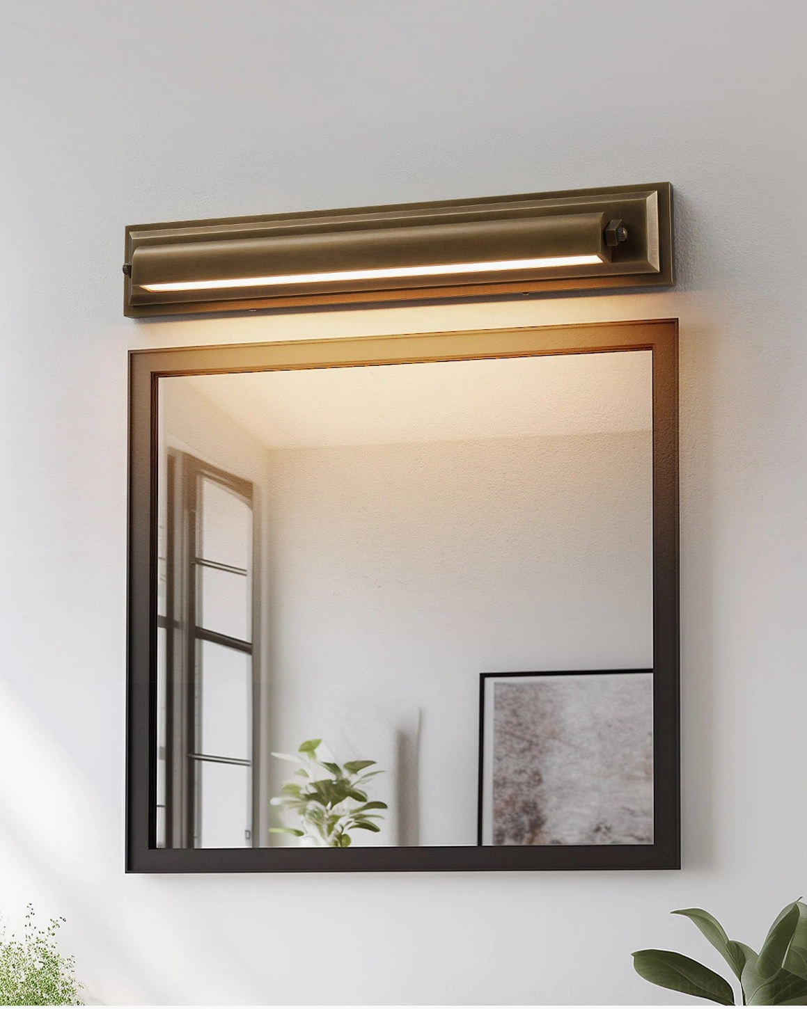 Davenport tiered wall sconce in bathroom vanity setting, positioned above mirror with stepped brass architectural design