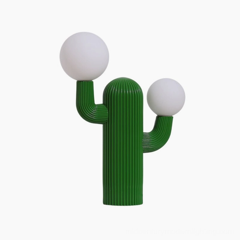 Deep green cactus table lamp, front three-quarter view highlighting geometric ribbed design and modern aesthetic