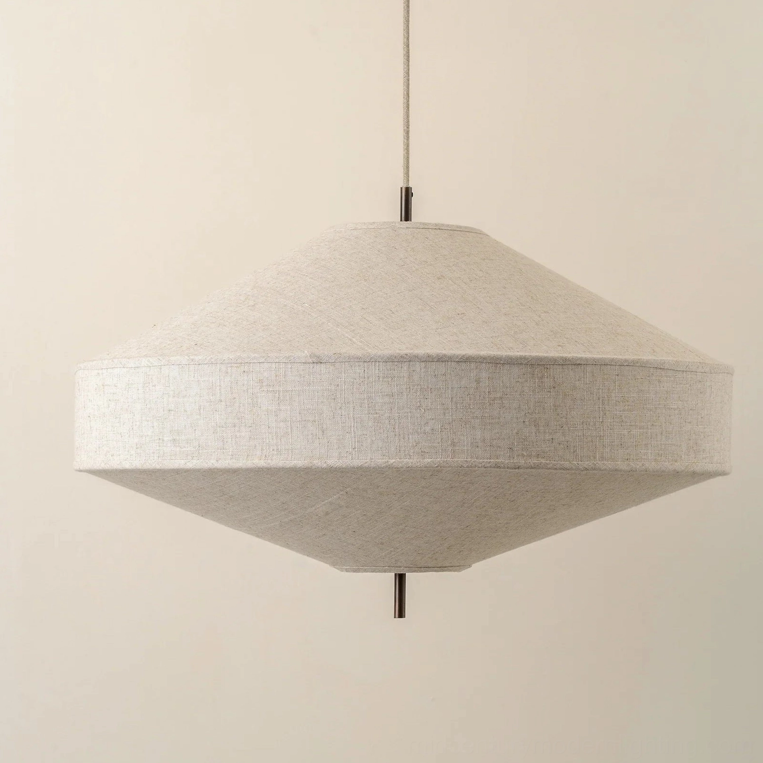 Wide-brim Delaney pendant light with linen diffuser, studio frontal view, minimalist geometric design