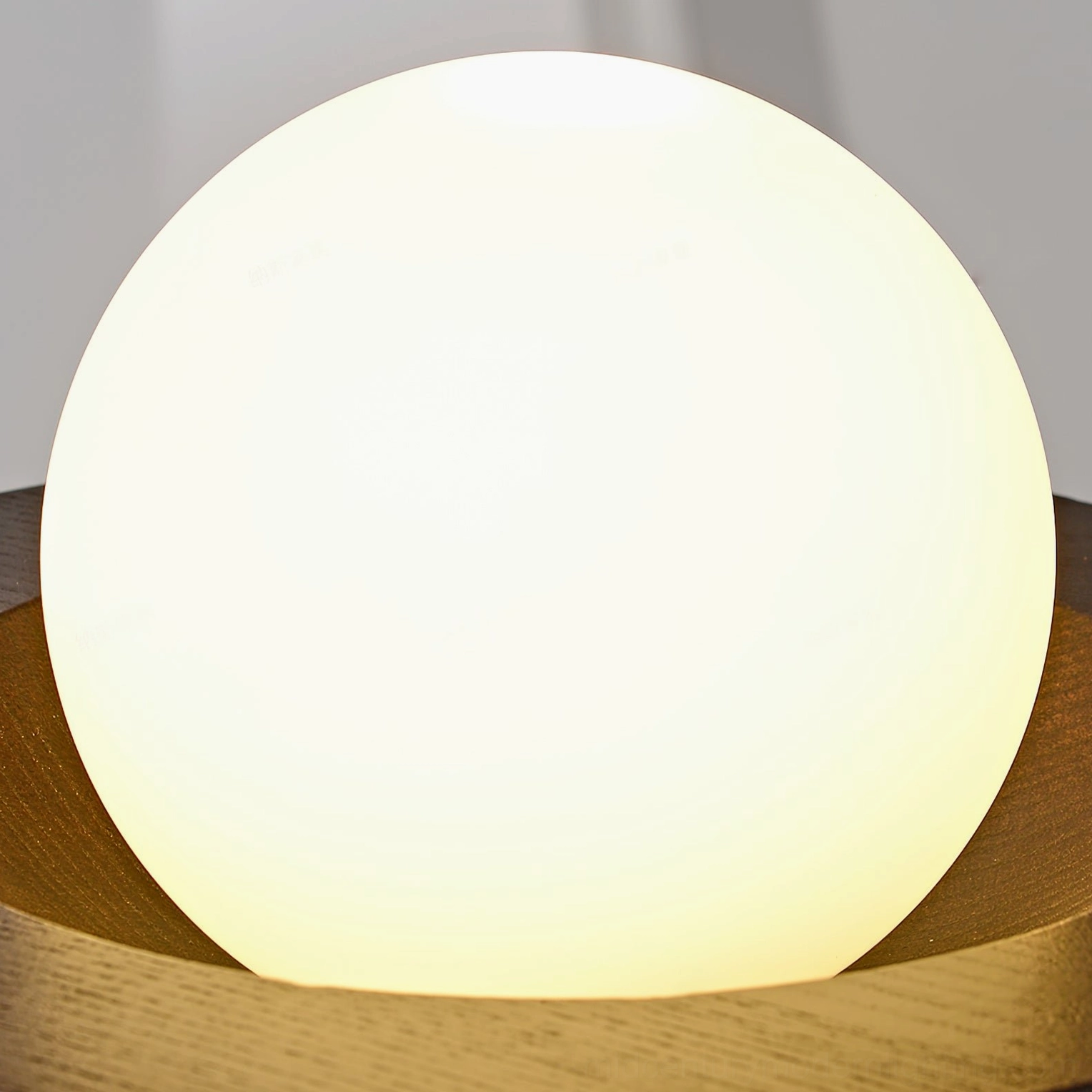 Delano pendant light showcasing Scandinavian design principles with natural wood tones and gentle dome shape
