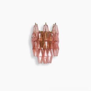 Delano polyhedral glass wall sconce with pink geometric glass tiles and brass frame, front view studio shot