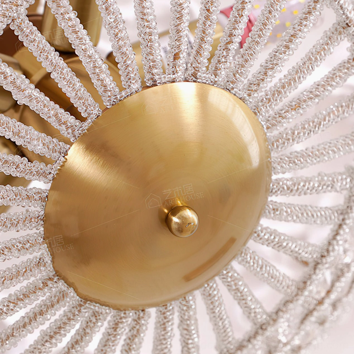Devan crystal ceiling light mount detail - brass gold base with radial crystal trim and mounting hardware